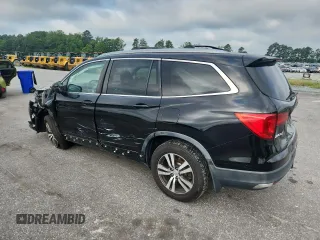 2016 Honda Pilot EX-L с VIN 5FNYF6H60GB097273, выставлен на аукционе Copart как лот 64010115 с пробегом 102 891 миль миль и Списание • Salvage title. История ставок и продаж доступна на DreamBid. Изображение 2.
