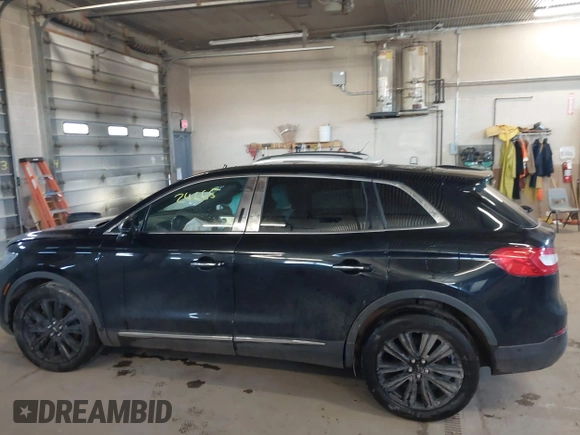 2016 Lincoln MKX Reserve with VIN 2LMTJ8LP2GBL29583, listed as a IAAI auction lot 41424665 with 140,061 mi miles and . Bid and sale history available at DreamBid. Image 14.