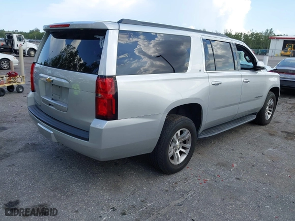 2018 Chevrolet Suburban LT with VIN 1GNSCHKC7JR162024, listed as a IAAI auction lot 41924750 with 112,640 mi miles. Bid and sale history available at carsss.com. Image 4.