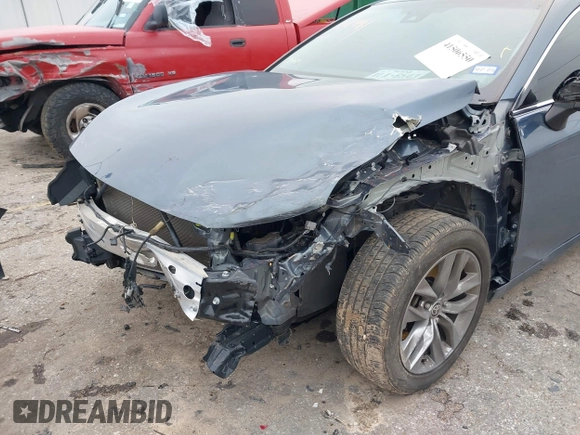 2022 Toyota Avalon XLE z VIN 4T1JZ1FB2NU073049, wystawiony jako IAAI lot #41506550 z przebiegiem 52 073 mil mil oraz . Historia ofert i sprzedaży dostępna na DreamBid. Obrazek 6.