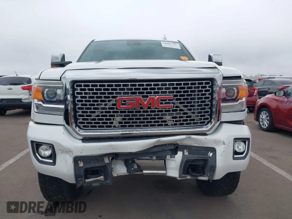 2016 GMC Sierra 2500HD Denali z VIN 1GT12UE89GF172877, wystawiony jako IAAI lot #41807741 z przebiegiem 36 719 mil mil oraz . Historia ofert i sprzedaży dostępna na DreamBid. Obrazek 12.