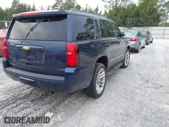 2019 Chevrolet Tahoe LT with VIN 1GNSCBKC7KR133119, listed as a IAAI auction lot 41570650 with 114,575 mi miles and . Bid and sale history available at DreamBid. Image 4.