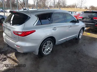 2013 Infiniti JX35 z VIN 5N1AL0MM3DC334693, wystawiony jako IAAI lot #41576207 z przebiegiem 113 677 mil mil oraz . Historia ofert i sprzedaży dostępna na DreamBid. Obrazek 4.