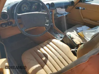 1987 Mercedes-Benz 560 with VIN WDBBA48D7HA063380, listed as a Copart auction lot 77820004 with 81,187 mi miles and Salvage Title. Bid and sale history available at carsss.com. Image 8.