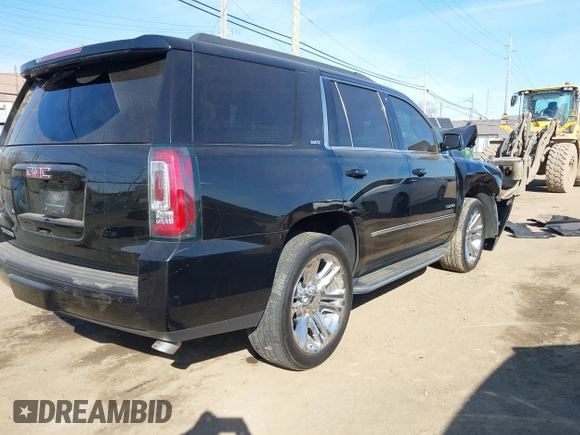 2016 GMC Yukon SLT with VIN 1GKS2BKC5GR253038, listed as a IAAI auction lot 41790030 with 101,039 mi miles. Bid and sale history available at carsss.com. Image 4.