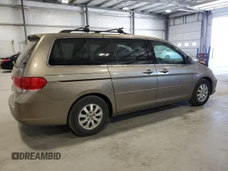 2009 Honda Odyssey EX с VIN 5FNRL38479B019599, выставлен на аукционе Copart как лот 56375175 с пробегом 241 526 миль миль и Списание • Salvage title. История ставок и продаж доступна на DreamBid. Изображение 3.