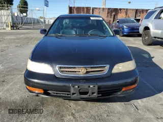 1997 Acura CL z VIN 19UYA1256VL020498, wystawiony jako Copart lot #77040994 z przebiegiem 202 124 mil mil oraz Czysty tytuł • Clean title. Historia ofert i sprzedaży dostępna na DreamBid. Obrazek 5.