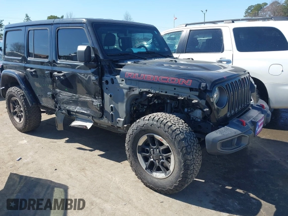 2019 Jeep Wrangler Unlimited Rubicon with VIN 1C4HJXFN1KW679028, listed as a IAAI auction lot 41654887 with 32,247 mi miles and . Bid and sale history available at DreamBid. Image 6.