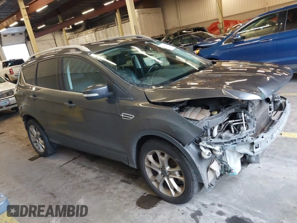 2016 Ford Escape Titanium with VIN 1FMCU9J92GUB63525, listed as a IAAI auction lot 41469824 with 156,773 mi miles. Bid and sale history available at carsss.com. Image 13.