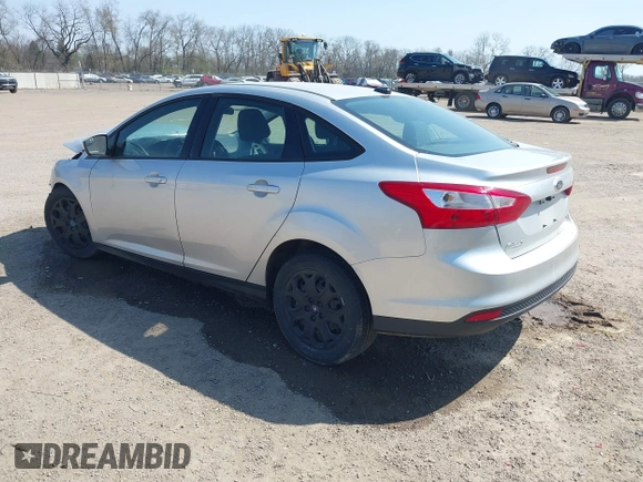 2012 Ford Focus SE with VIN 1FAHP3F2XCL217086, listed as a IAAI auction lot 42072717 with 112,549 mi miles. Bid and sale history available at carsss.com. Image 3.