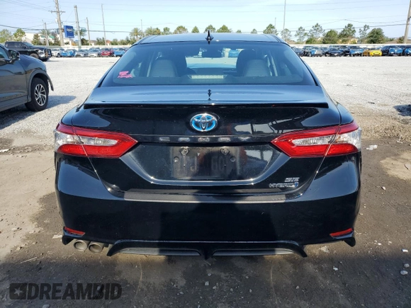 2019 Toyota Camry Hybrid LE z VIN 4T1B21HK1KU516390, wystawiony jako Copart lot #54856015 z przebiegiem 94 504 mil mil oraz Nie do naprawy • Non repairable. Historia ofert i sprzedaży dostępna na DreamBid. Obrazek 6.