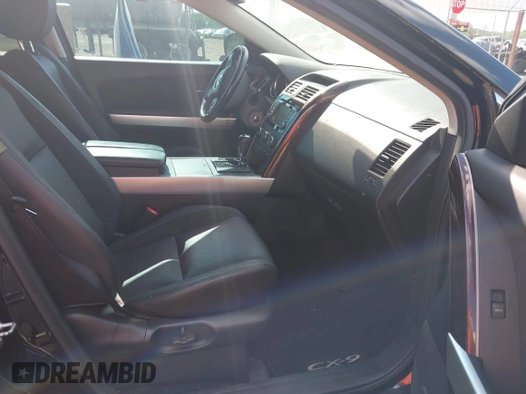 2015 Mazda CX-9 Grand Touring with VIN JM3TB2DA4F0464186, listed as a IAAI auction lot 42227595 with 124,526 mi miles and . Bid and sale history available at DreamBid. Image 5.
