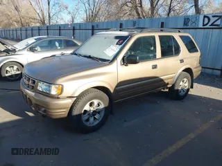 2000 Isuzu Rodeo with VIN 4S2DM58W6Y4335025, listed as a IAAI auction lot 41460869 with 247,342 mi miles. Bid and sale history available at carsss.com. Image 2.