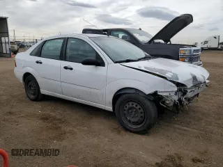 2006 Ford Focus S with VIN 1FAFP34N06W105551, listed as a Copart auction lot 52355575 with 176,617 mi miles and Salvage Title. Bid and sale history available at carsss.com. Image 4.