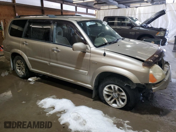 2005 Suzuki XL7 LX with VIN JS3TX92V054105984, listed as a Copart auction lot 89070865 with 135,453 mi miles and Salvage title. Bid and sale history available at DreamBid. Image 4.