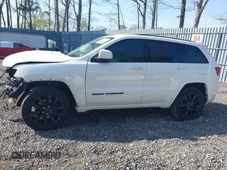 2018 Jeep Grand Cherokee Altitude with VIN 1C4RJFAG4JC309523, listed as a IAAI auction lot 42159534 with 86,682 mi miles and . Bid and sale history available at DreamBid. Image 14.