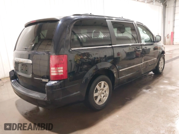 2010 Chrysler Town & Country Touring z VIN 2A4RR5D1XAR148753, wystawiony jako IAAI lot #41830153 z przebiegiem 158 867 mil mil oraz . Historia ofert i sprzedaży dostępna na DreamBid. Obrazek 4.
