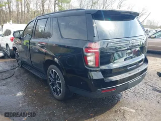 2023 Chevrolet Tahoe RST with VIN 1GNSCRKD7PR225100, listed as a IAAI auction lot 41758562 with 34,393 mi miles. Bid and sale history available at carsss.com. Image 3.