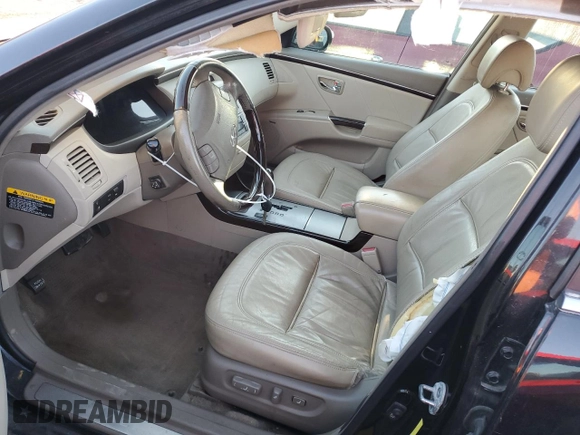 2009 Hyundai Azera Limited z VIN KMHFC46F69A344892, wystawiony jako Copart lot #79239454 z przebiegiem 205 624 mil mil oraz Szkoda całkowita • Salvage title. Historia ofert i sprzedaży dostępna na DreamBid. Obrazek 7.