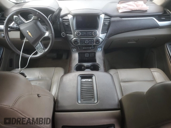 2017 Chevrolet Suburban LT z VIN 1GNSCHKC8HR330084, wystawiony jako Copart lot #52335325 z przebiegiem Nie podano mil oraz Szkoda całkowita • Salvage title. Historia ofert i sprzedaży dostępna na DreamBid. Obrazek 8.