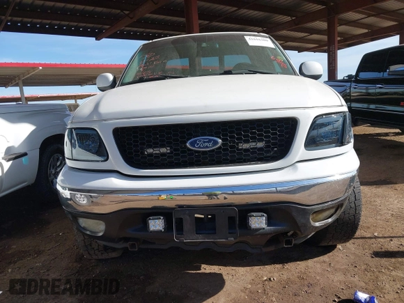 1999 Ford F-150 XL with VIN 2FTRX18L9XCA21004, listed as a IAAI auction lot 41616300 with 186,620 mi miles. Bid and sale history available at carsss.com. Image 12.