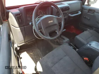 2005 Jeep Wrangler X with VIN 1J4FA39S35P360241, listed as a Copart auction lot 63486375 with 85,051 mi miles and Salvage title. Bid and sale history available at DreamBid. Image 8.