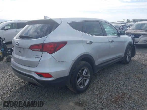 2017 Hyundai Santa Fe 2.4L with VIN 5XYZTDLB7HG444081, listed as a IAAI auction lot 42207558 with 119,054 mi miles and . Bid and sale history available at DreamBid. Image 4.