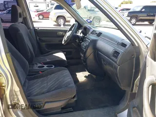 1999 Honda CR-V EX with VIN JHLRD1861XC025446, listed as a IAAI auction lot 41852155 with 201,598 mi miles. Bid and sale history available at carsss.com. Image 5.