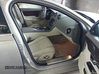2013 Jaguar XJ Portfolio with VIN SAJWJ2GD0D8V50948, listed as a IAAI auction lot 42067884 with 110,053 mi miles and . Bid and sale history available at DreamBid. Image 5.