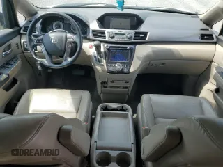 2014 Honda Odyssey Touring with VIN 5FNRL5H94EB080815, listed as a Copart auction lot 65244325 with 153,314 mi miles and Salvage title. Bid and sale history available at DreamBid. Image 8.