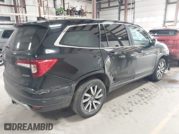 2019 Honda Pilot EX-L with VIN 5FNYF6H5XKB067858, listed as a IAAI auction lot 41643807 with 102,114 mi miles and . Bid and sale history available at carsss.com. Image 4.