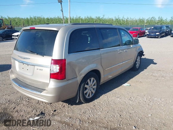 2013 Chrysler Town & Country Touring with VIN 2C4RC1BG7DR621665, listed as a IAAI auction lot 42133109 with 135,898 mi miles and . Bid and sale history available at DreamBid. Image 4.