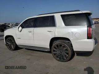 2016 GMC Yukon SLT with VIN 1GKS1BKC8GR233210, listed as a Copart auction lot 65605244 with 151,237 mi miles and Clean Title. Bid and sale history available at carsss.com. Image 2.
