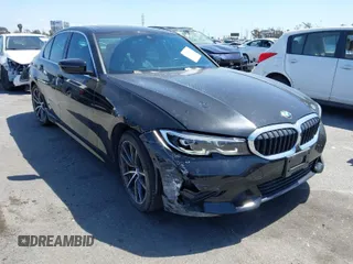 2019 BMW 3 Series 330i xDrive with VIN WBA5R7C5XKAJ78505, listed as a IAAI auction lot 41955059 with 53,216 mi miles. Bid and sale history available at carsss.com. Image 1.