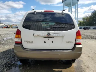 2003 Mazda Tribute LX with VIN 4F2CZ94133KM19916, listed as a Copart auction lot 73718284 with 151,644 mi miles and Salvage Title. Bid and sale history available at carsss.com. Image 6.