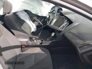 2015 Ford Focus SE with VIN 1FADP3F29FL292655, listed as a IAAI auction lot 41090945 with 106,060 mi miles. Bid and sale history available at carsss.com. Image 5.