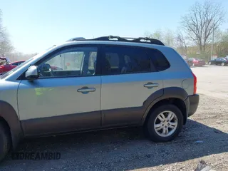 2006 Hyundai Tucson GLS with VIN KM8JN12D06U285856, listed as a IAAI auction lot 42112640 with 157,016 mi miles. Bid and sale history available at carsss.com. Image 14.