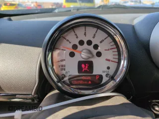 2012 MINI Countryman S with VIN WMWZC5C50CWL63321, listed as a Copart auction lot 52427065 with 126,898 mi miles and Salvage Title. Bid and sale history available at DreamBid. Image 9.
