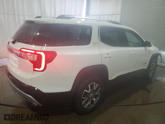 2023 GMC Acadia SLT with VIN 1GKKNML4XPZ188990, listed as a Copart auction lot 46782705 with 61,340 mi miles and Clean Title. Bid and sale history available at DreamBid. Image 3.