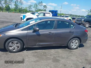 2015 Honda Civic Sedan LX with VIN 19XFB2F58FE082269, listed as a IAAI auction lot 42031294 with 105,260 mi miles. Bid and sale history available at carsss.com. Image 14.