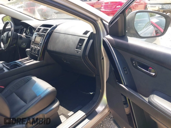 2014 Mazda CX-9 Touring with VIN JM3TB3CV1E0436421, listed as a IAAI auction lot 42634172 with 190,306 mi miles and . Bid and sale history available at DreamBid. Image 5.