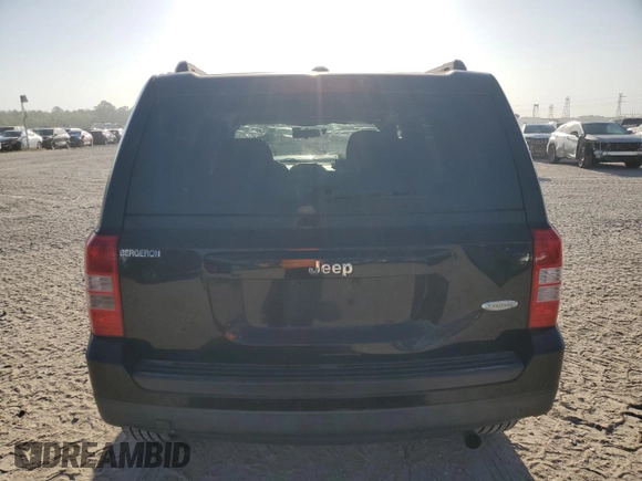 2015 Jeep Patriot Latitude with VIN 1C4NJPFB4FD298011, listed as a Copart auction lot 52152845 with 95,101 mi miles and Salvage Title. Bid and sale history available at DreamBid. Image 6.