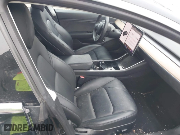 2018 Tesla Model 3 Long Range Battery with VIN 5YJ3E1EB1JF127289, listed as a IAAI auction lot 41484253 with 60,577 mi miles and . Bid and sale history available at DreamBid. Image 5.