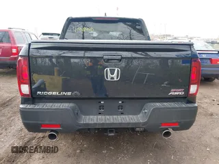 2021 Honda Ridgeline Sport with VIN 5FPYK3F19MB017134, listed as a IAAI auction lot 41942440 with 30,794 mi miles and . Bid and sale history available at DreamBid. Image 16.