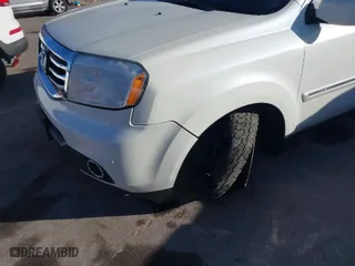 2015 Honda Pilot Touring with VIN 5FNYF4H91FB037290, listed as a IAAI auction lot 40912739 with 154,772 mi miles. Bid and sale history available at carsss.com. Image 6.