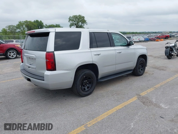 2019 Chevrolet Tahoe Commercial with VIN 1GNSKDEC8KR348535, listed as a IAAI auction lot 42800998 with 133,474 mi miles and . Bid and sale history available at DreamBid. Image 4.