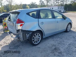 2016 Toyota Prius v Two with VIN JTDZN3EU2GJ042440, listed as a IAAI auction lot 42008316 with 160,000 mi miles. Bid and sale history available at carsss.com. Image 4.