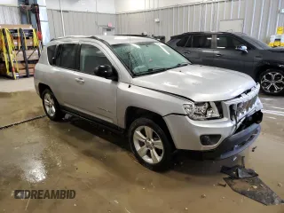 2011 Jeep Compass with VIN 1J4NT1FB0BD245673, listed as a Copart auction lot 82597074 with 207,695 mi miles and Clean Title. Bid and sale history available at carsss.com. Image 4.