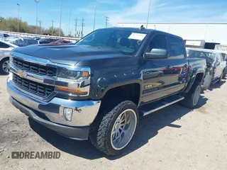 2018 Chevrolet Silverado 1500 LT with VIN 3GCPCREC1JG127396, listed as a IAAI auction lot 41790850 with 138,725 mi miles and . Bid and sale history available at DreamBid. Image 21.