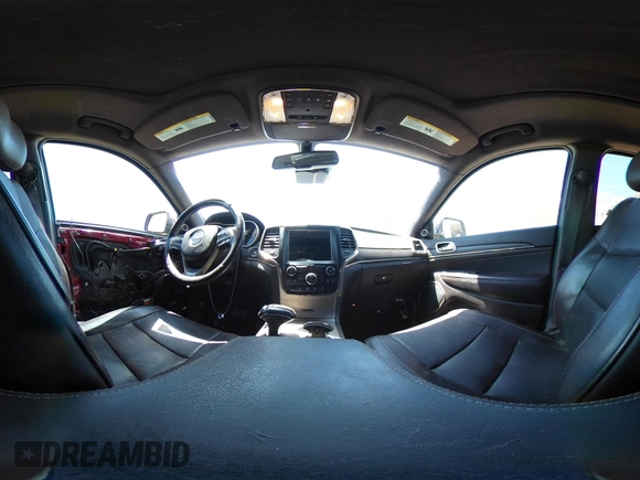 2014 Jeep Grand Cherokee Summit with VIN 1C4RJFJT1EC237358, listed as a IAAI auction lot 42602245 with 106,821 mi miles and . Bid and sale history available at DreamBid. Image 18.